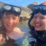 two girls snorkling for clues ko tao treasure hunt